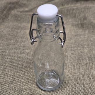 5-1/2" tall clear glass bottle SB8
