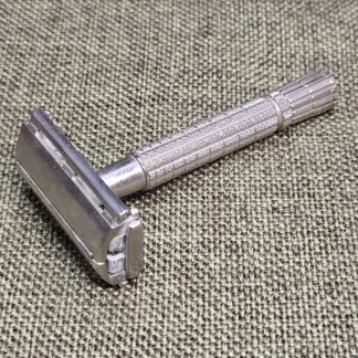 Vintage twist-to-open double-edge safety razor, 1950s or 60s