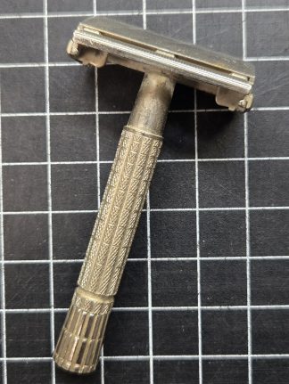 Vintage twist-to-open double-edge safety razor, 1950s or 60s