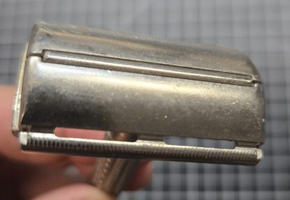 Vintage twist-to-open double-edge safety razor, 1950s or 60s